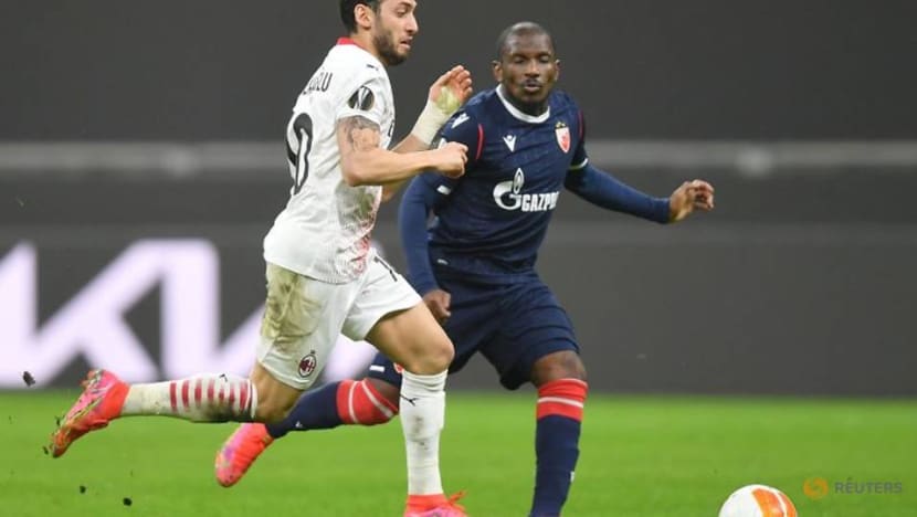 Football: Milan limp through on away goals after draw with Red Star Football: Milan limp through on away goals after draw with Red Star