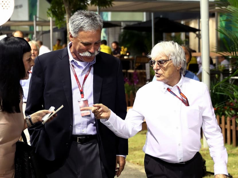 Ecclestone (right) says there will not be any problems working with new Formula One Group chairman Carey. Photo: Getty Images