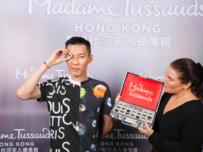 Former athlete Lee Chong Wei selecting the eye colour closest to his own for the wax figure at Madame Tussauds Hong Kong.
