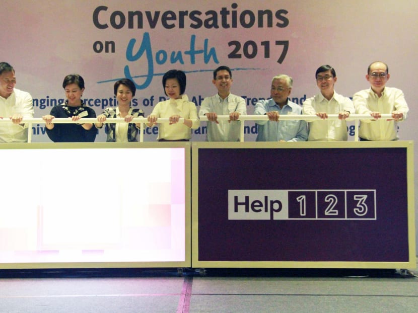 Help123 is launched at the biennial symposium Conversations on Youth yesterday. A study last year found that some 12-year-olds in Singapore spend more than six and a half hours a day online. Photo: Esther Leong