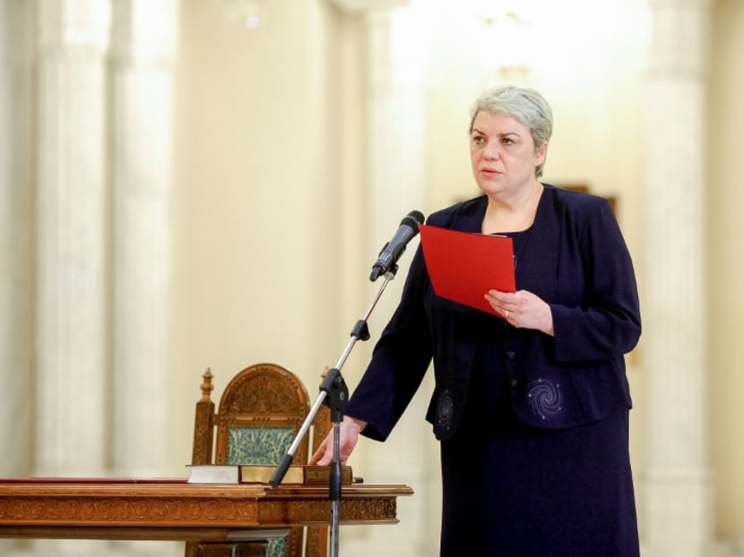 Sevil Shhaideh is sworn in for the position of minister for regional administration and public administration, in Bucharest, Romania, May 20, 2015. Picture taken May 20, 2015. Photo: Inquam Photos/Ovidiu Micsik/via Reuters
