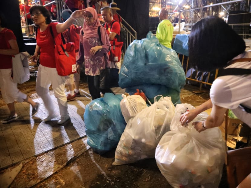 ‘Less trash’ left behind at NDP 2019, but empty plastic bottles, food wrappers among litter lying around ‘Less trash’ left behind at NDP 2019, but empty plastic bottles, food wrappers among litter lying around