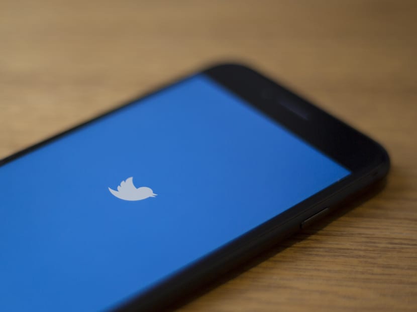 The Twitter logo is seen on a phone in this photo illustration in Washington, US on July 10, 2019.