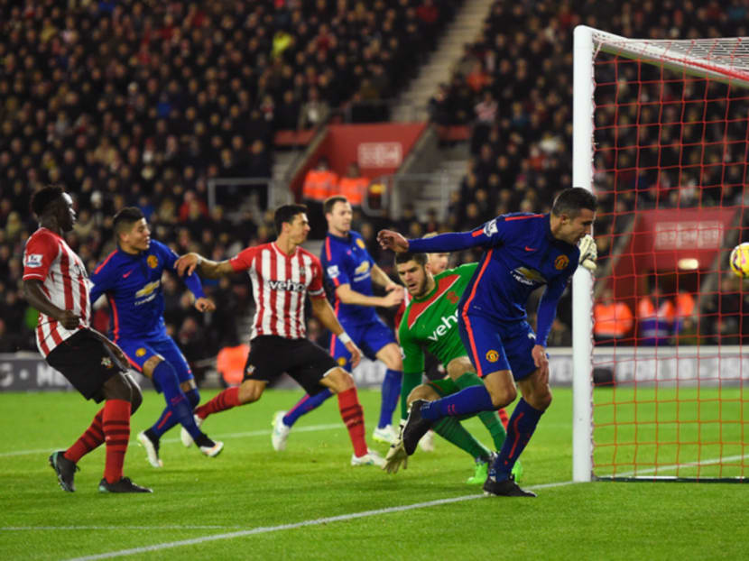 Van Persie (right) scored a brace as United saw off Southampton 2-1 to climb to third in the table. Photo: GETTY IMAGES