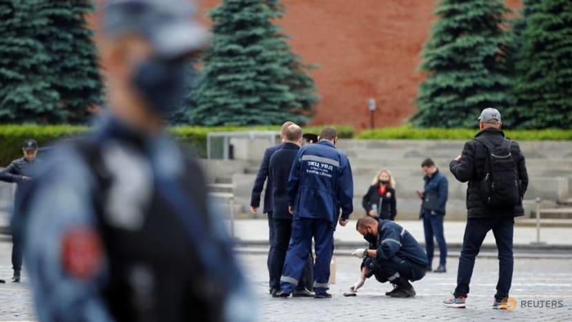 Russian held in jail over faked suicide 'protest performance' on Red Square Russian held in jail over faked suicide 'protest performance' on Red Square