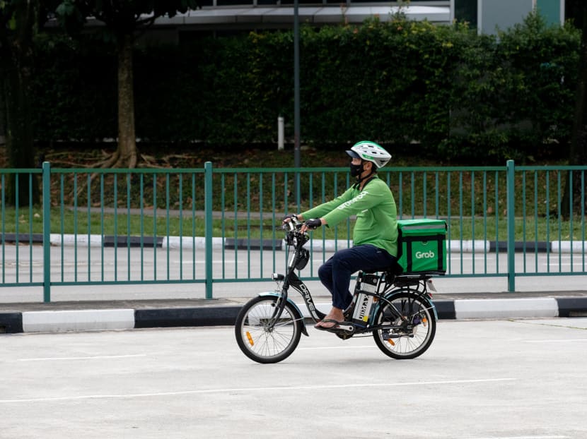 A food delivery rider near Jem mall in Jurong East on May 17, 2021.
