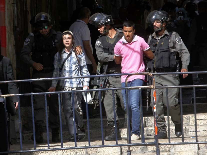 Gallery: Israeli police enter Jerusalem holy site, block Arab youths