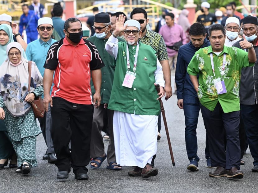 Mr Abdul Hadi Awang (centre), president of the Malaysian Islamic Party, (PAS) waves to his supporters during the general election in Marang,Terengganu on Nov 19, 2022.