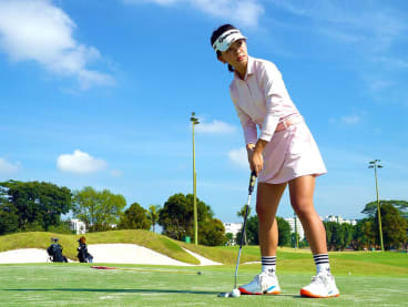 Ms Grace Hu, 21, switched from badminton to golf and has not looked back. 