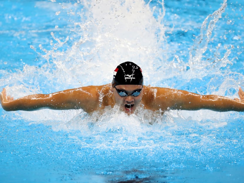 Schooling creates S’pore swimming history by winning gold in 100m butterfly final Schooling creates S’pore swimming history by winning gold in 100m butterfly final