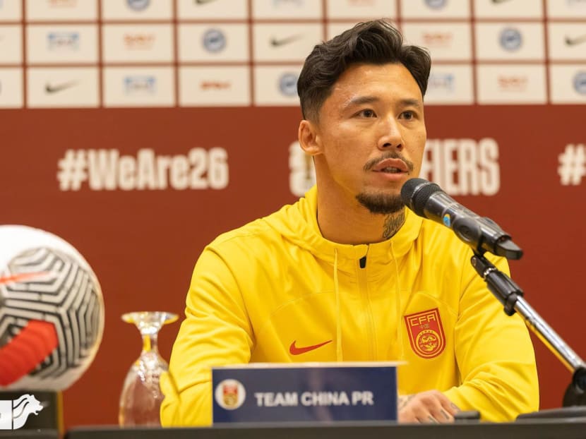 China's football captain Zhang Linpeng speaking at a press conference ahead of the Fifa World Cup qualifiers match against Singapore on March 20, 2024.