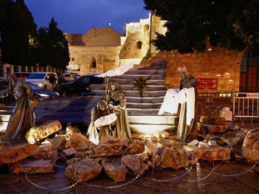 Sombre Bethlehem marks Christmas with vigil as bombs rain on Gaza TODAY