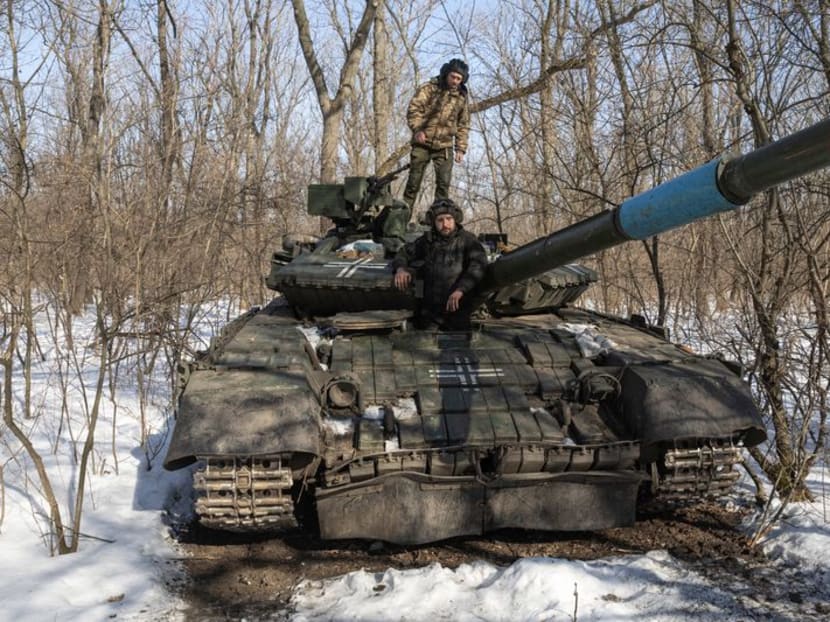 Ukrainian servicemen of the 17th Independent Tanks Brigade are seen atop of a T-64 tank, as Russia's attack on Ukraine continues, near the frontline town of Bakhmut, Donetsk region, Ukraine February 23, 2023. REUTERS/Marko Djurica  