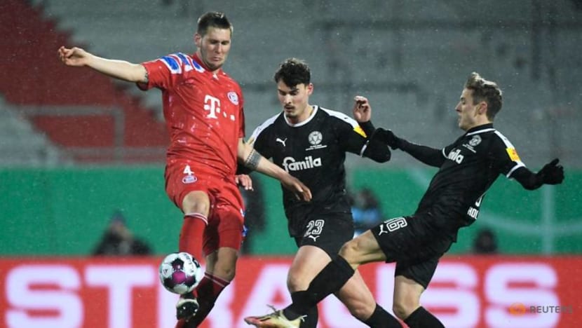 Football: Holders Bayern knocked out of German Cup by second tier Kiel Football: Holders Bayern knocked out of German Cup by second tier Kiel