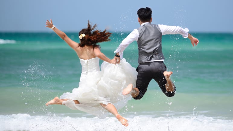 Commentary: Why are people spending more on travel and weddings even as prices go up?