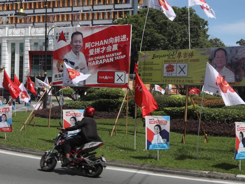 Party flags and posters of candidates in Kota Kinabalu, Sabah, on Nov 13, 2022.