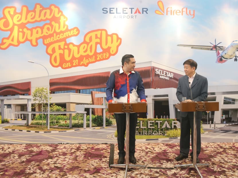 Singapore Transport Minister Khaw Boon Wan and his Malaysian counterpart Anthony Loke at the Seletar Airport on Sunday, April 21, to welcome the first Firefly flight to the airport after four months of impasse due to a bilateral dispute.