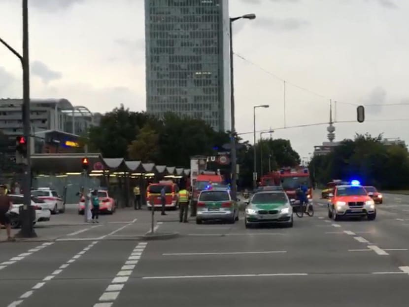 Police in Munich, Germany respond to a shooting at a shopping center in Munich, Friday July 22, 2016.  Munich police confirm shots have been fired at Olympia Einkaufszentrum shopping center but say they don't have any details about casualties. Police are responding in large numbers. (AP Photo/APTV)