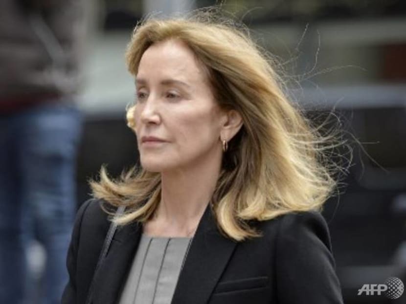 Felicity Huffman pleads guilty in college admissions scandal Felicity Huffman pleads guilty in college admissions scandal