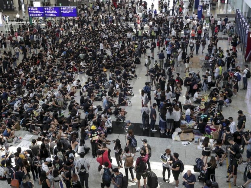 A sit-in protest at the Hong Kong International Airport. A sit-in protest at the Hong Kong International Airport.