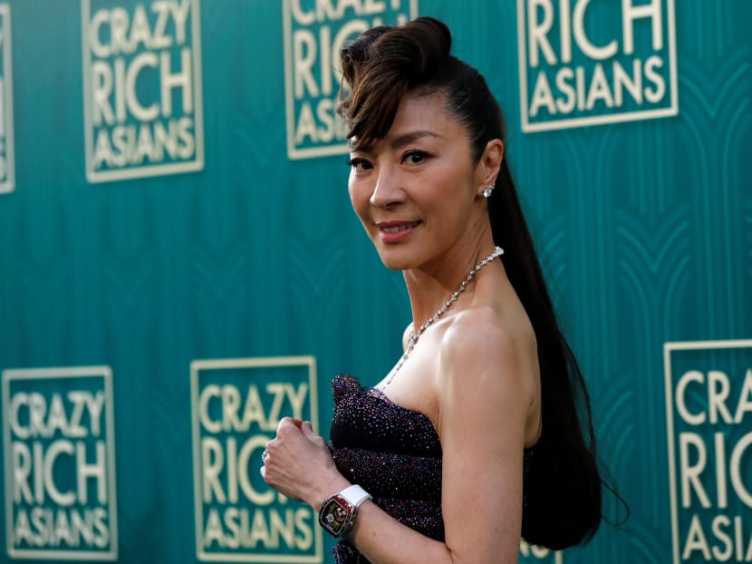 Actress Michelle Yeoh posing at the premiere for "Crazy Rich Asians" in Los Angeles, California. Screen Daily reported that the first-look deal for film rights to "Billion Dollar Whale" includes producing, directing and choosing acting opportunities for Yeoh, in partnership with SK Global and her company, Mythical Films.