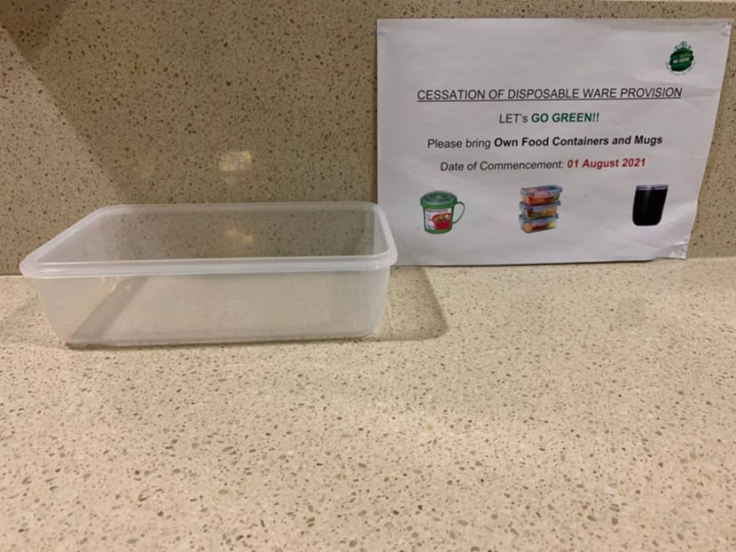 A sign at the writer's residential hall at NUS on its new rule on residents needing to use their own containers to take away food.