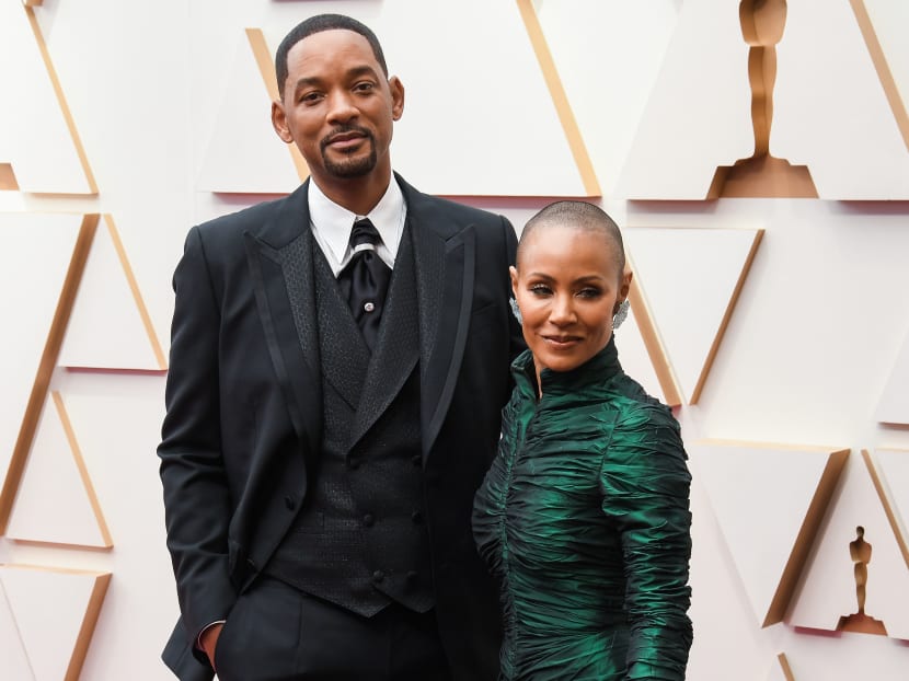 Will Smith and Jada Pinkett Smith walking on the red carpet at the 94th Academy Awards held at the Dolby Theatre in Hollywood, CA on March 27, 2022.