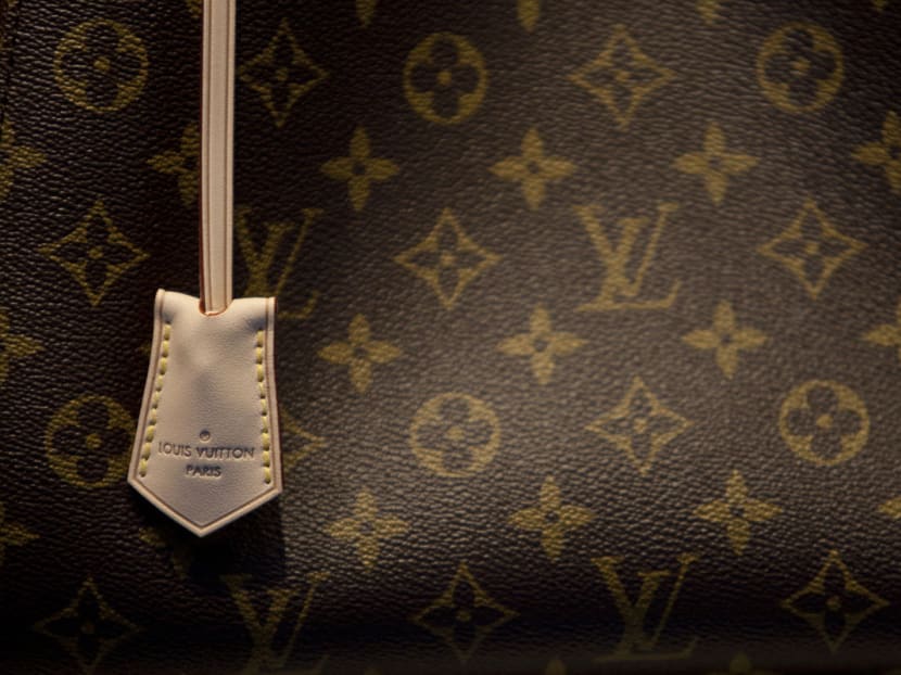 LVMH Moet Hennessy Louis Vuitton SA is introducing more expensive products at handbag maker Louis Vuitton, while increasing investment at some of its smaller fashion brands amid competition from lower-priced labels such as Michael Kors and Coach. Photo: Bloomberg
