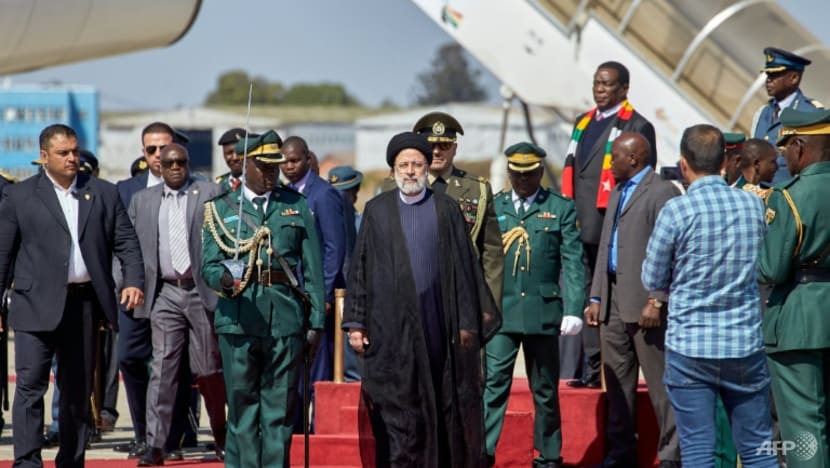 Iran's Raisi visits fellow outlier Zimbabwe ahead of key vote
