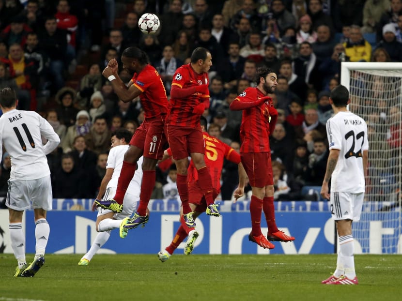 Gallery: Ten-man Real thump Galatasaray to seal top spot