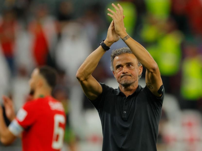 Spain's coach Luis Enrique applauding supporters after his team lost the Qatar 2022 World Cup round-of-16 football match against Morocco on Dec 6, 2022. 