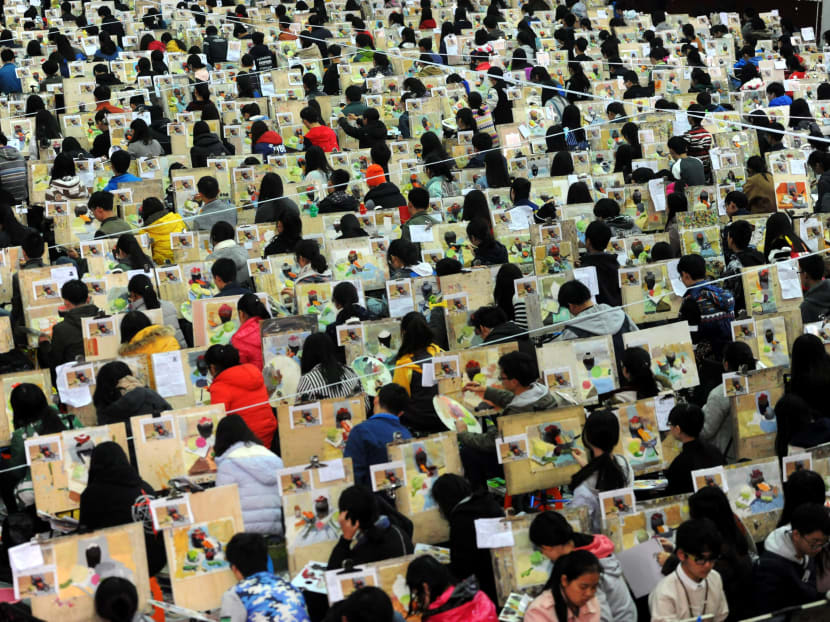 Students participate in a fine arts exam in Wuhan, Hebei Province in China. As technology advances, robot tutors are set to help students take on China’s daunting Gaokao college entrance exams. Photo: Reuters