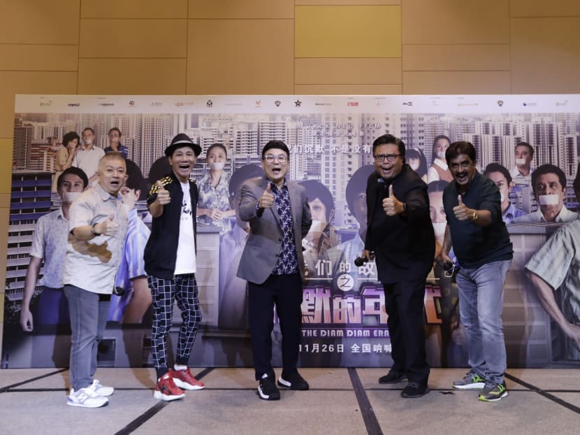 Director Jack Neo (centre) with the cast of The Diam Diam Era at the film's premier on Nov 20.