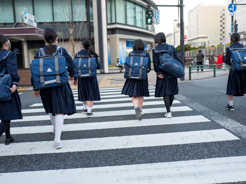 Junior high school students walking in the streets of Tokyo.