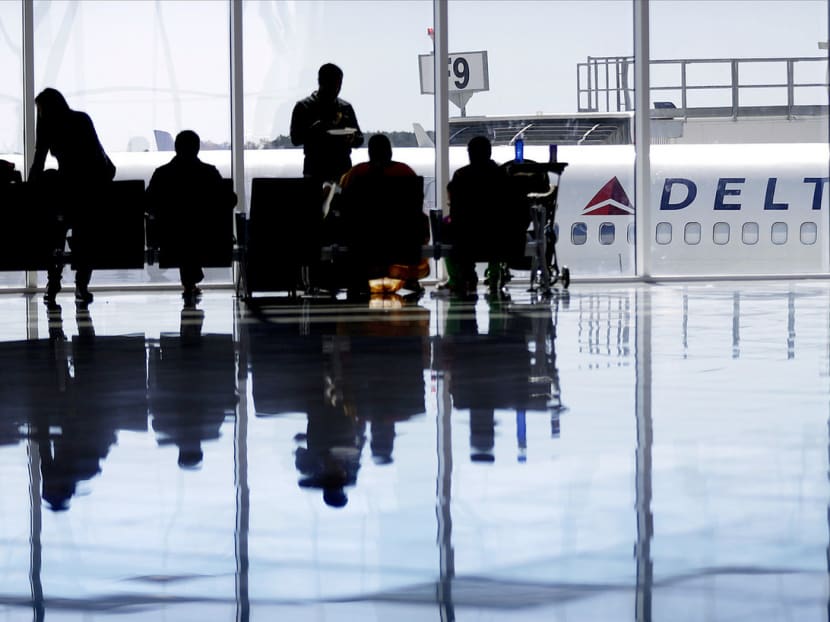 Delta Air Lines has increased the amounts passengers can be offered to give up their seats to up to almost US$10,000 in extreme cases — something passengers can take advantage of if they act in collusion. Photo: AP