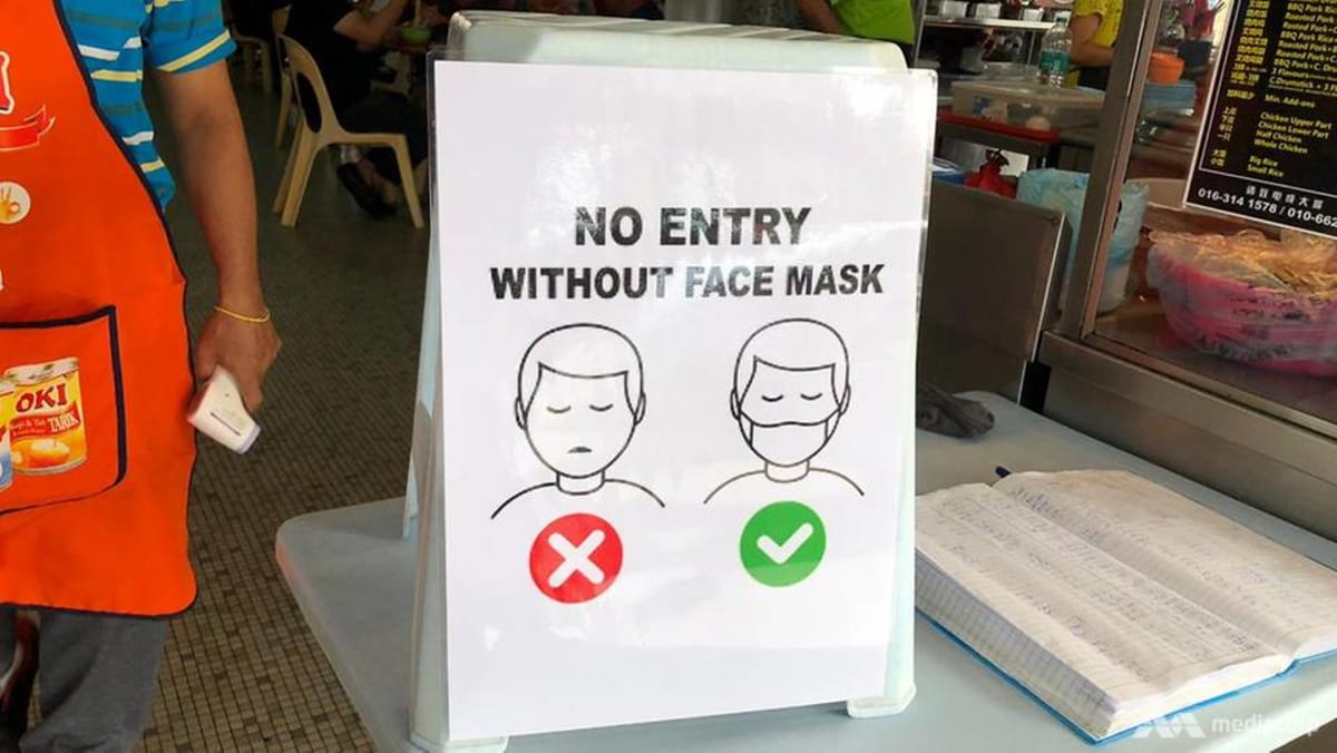 Disinfection Stations Cardboard Mascots For Social Distancing Some Malaysian Businesses Go The Extra Mile In New Normal Cna