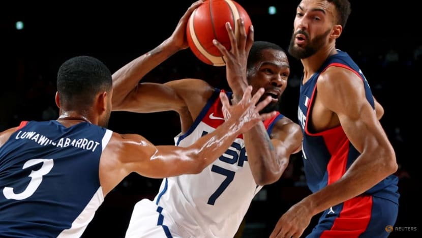Olympics-US takes 16th men's basketball gold, rain threatens baseball Olympics-US takes 16th men's basketball gold, rain threatens baseball