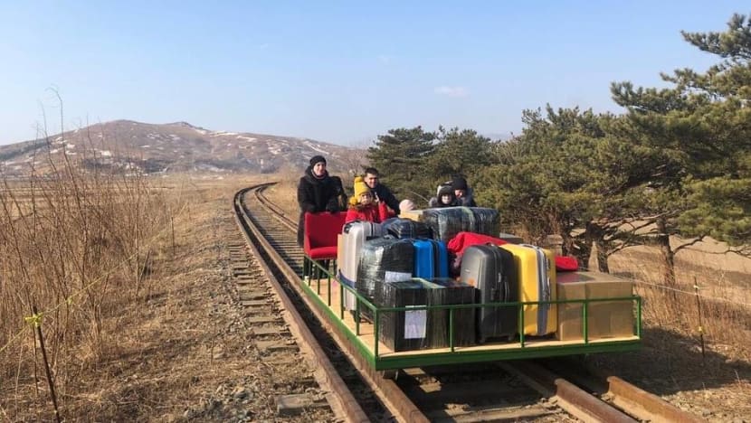 Russian diplomats push their way home with handcar out of North Korea Russian diplomats push their way home with handcar out of North Korea
