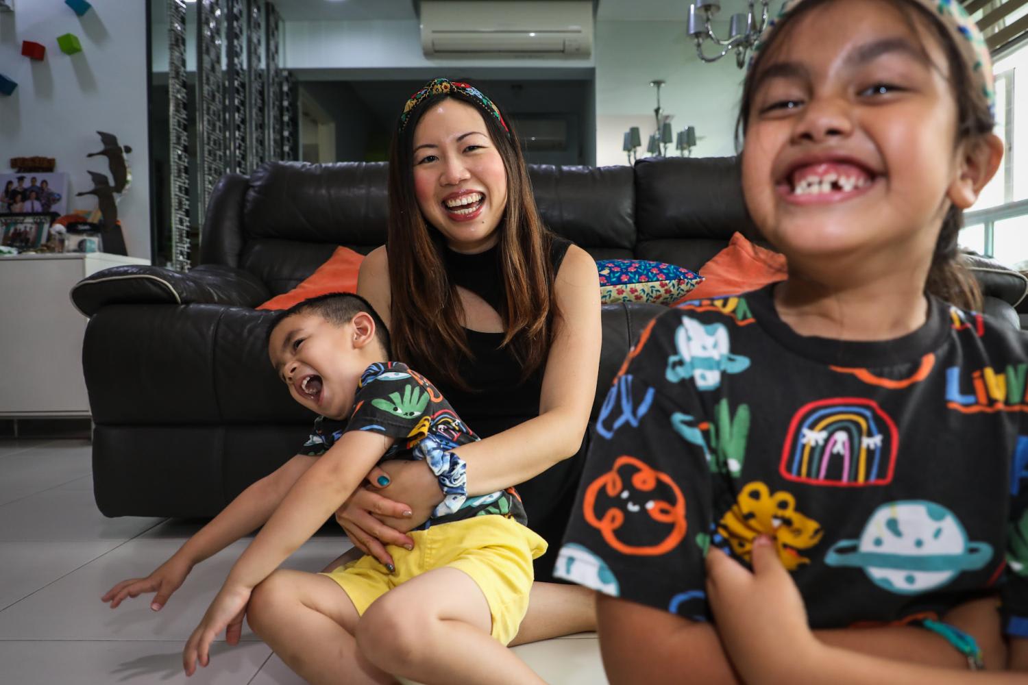 Ms Bryna Sim at home with her two children on July 14, 2022. Ms Bryna Sim at home with her two children on July 14, 2022.