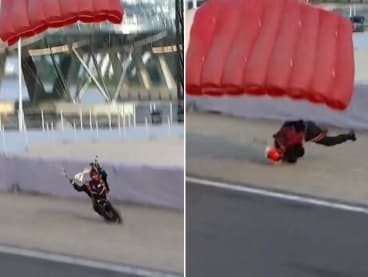 A Red Lion parachutist suffers an incident during his landing at the National Day Parade 2022. 