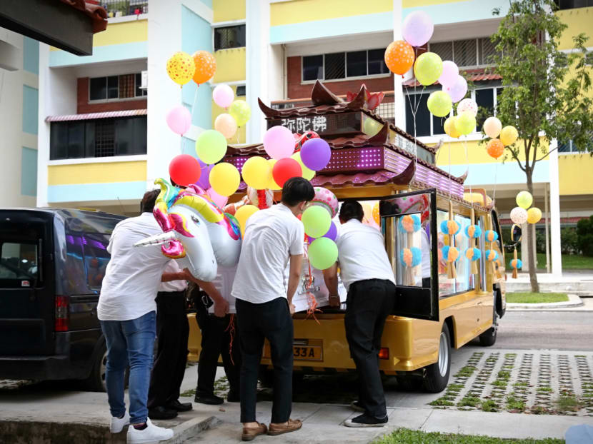 The family of four-year-old Eleanor Tan Si Xuan, who was killed in a road accident on Monday, sent her off in a coffin that was decorated with balloons, flowers, props such as angel-like wings, and other paraphernalia. Photo: Nuria Ling/TODAY