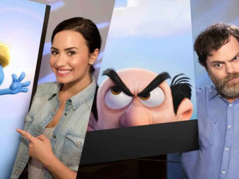 Demi Lovato (left) will voice Smurfette and Rainn Wilson (right) will voice evil wizard Gargamel in Smurf reboot Get Smurfy. Photo: Variety.com/ Reuters