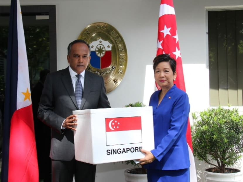 Minister for Foreign Affairs K Shanmugam and Philippines Ambassador Minda Cruz at the presentation of Singapore's additional contribution in kind to the Philippines for Typhoon Haiyan. Photo: Ministry of Foreign Affairs
