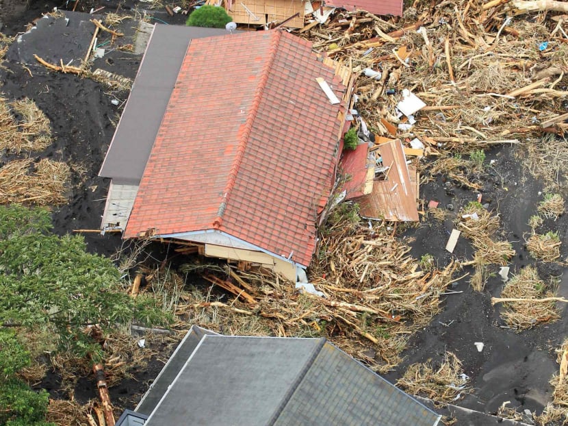 Typhoon, mudslides kill 17 in Japan