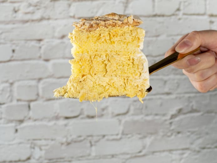 At this durian cafe in Jalan Besar, you can enjoy durian high tea, fried durian and more 11 whisky durian cake slice
