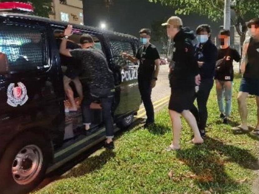Police arrest suspected offenders at an alleged illegal gambling den in Upper Thomson Road