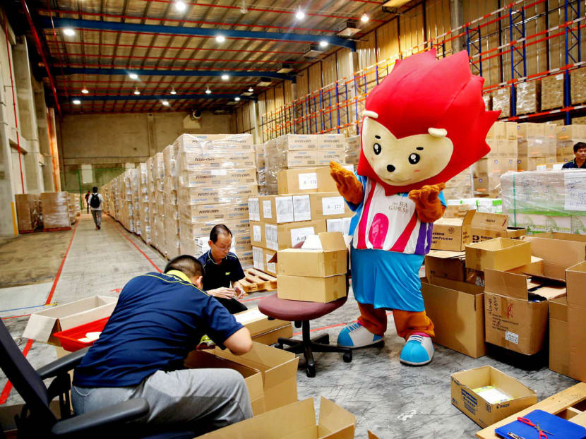 Nila, the 28th SEA Games mascot, at the official opening of SINGSOC Logistics Centre at CWT Logistics Hub1 yesterday. Photo: Wee Teck Hian