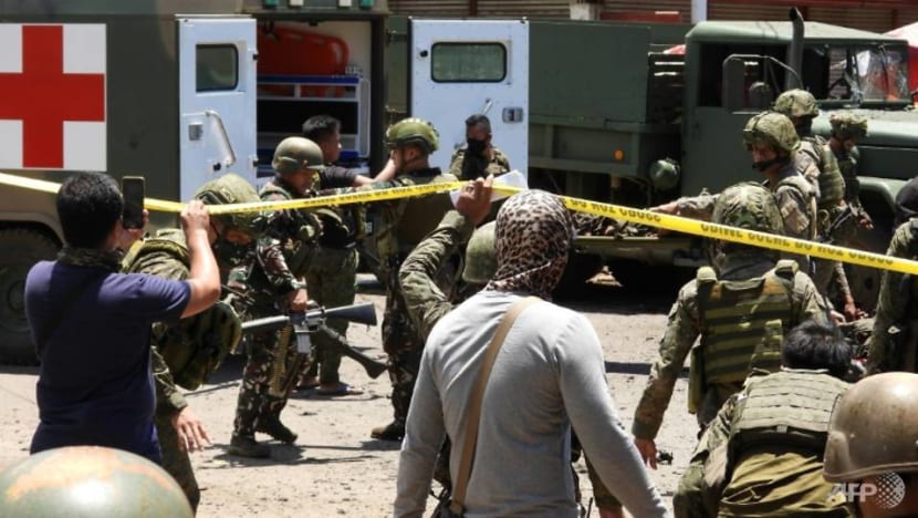 Bombings kill 15, wound dozens in Philippine island of Jolo Bombings kill 15, wound dozens in Philippine island of Jolo