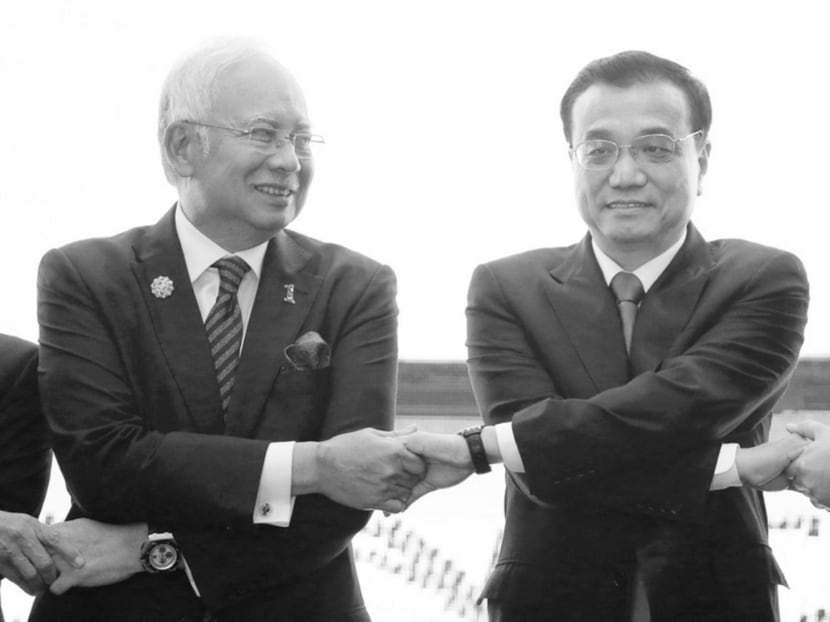 Malaysia’s Premier Najib Razak (left) with China’s Premier Li Keqiang in KL on Sunday. The two countries traded purchases in each other’s debt as lovers might trade poems. Photo: Reuters