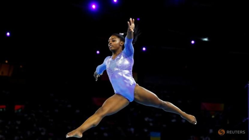 Biles warms up for Tokyo by claiming seventh US title Biles warms up for Tokyo by claiming seventh US title